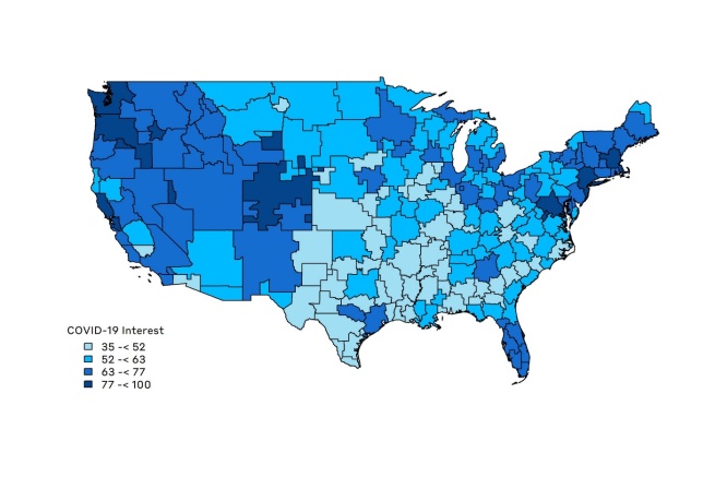 A map of the US which shows google searches for COVID-19 in different areas of the country, the darkest blue areas are the West Coast and the North East